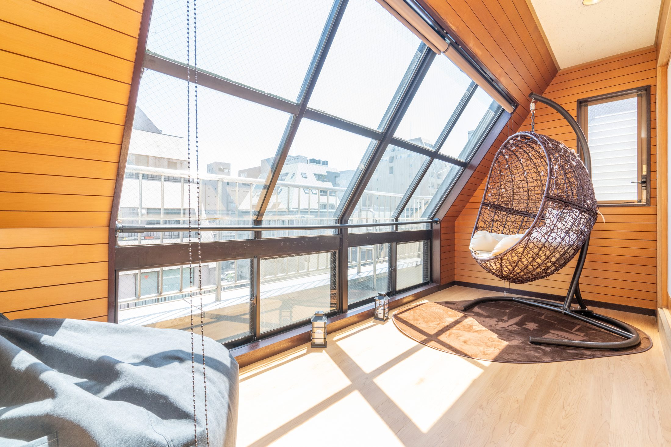 Sunroom with a rocking chair